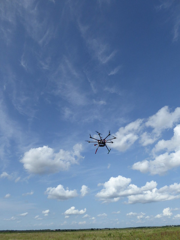 An Octocopter uncrewed aerial system hovers over the SGP.