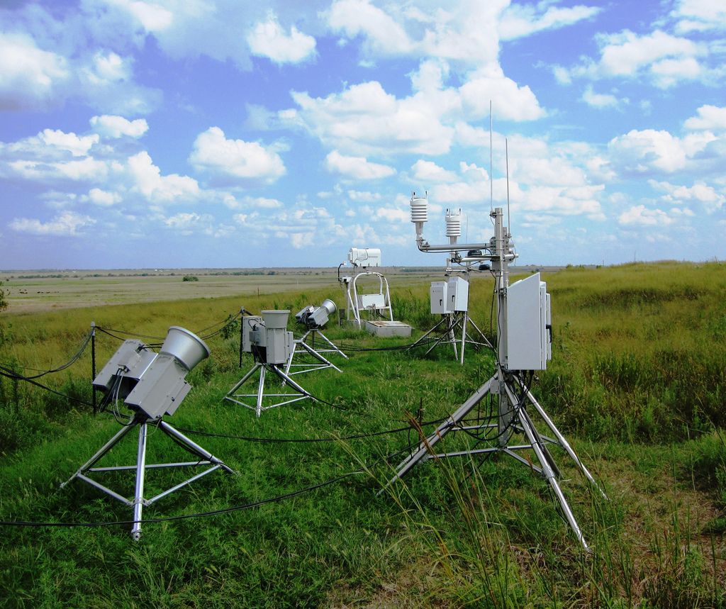 Three scanning microwave radiometers (left) undergo testing in the instrument field at the Southern Great Plains site's Central Facility.