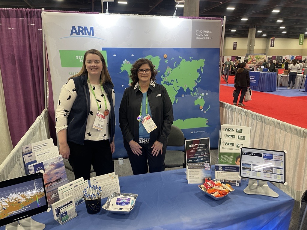 ARM Communications team members Michelle Prichard (left) and Rolanda Jundt are pictured at the ARM booth during the 2024 National Diversity in STEM (NDiSTEM) conference in Phoenix, Arizona. ARM photo.