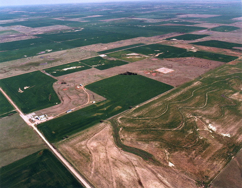 Aerial view shows brown and green patches of land across the SGP
