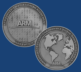 ARM hands out a challenge coin to each of its service award winners. The coin's front and back are shown here. The front has the ARM logo in the middle, Atmospheric Radiation Measurement spelled out at the top edge, and user facility at the bottom edge. The back includes an image of the world, with North America, South America, Africa, Europe, and the Middle East visible. It has the words "Awarded for Exceptional Service to the ARM User Community" wrapping around the edge and the ARM logo at the bottom.