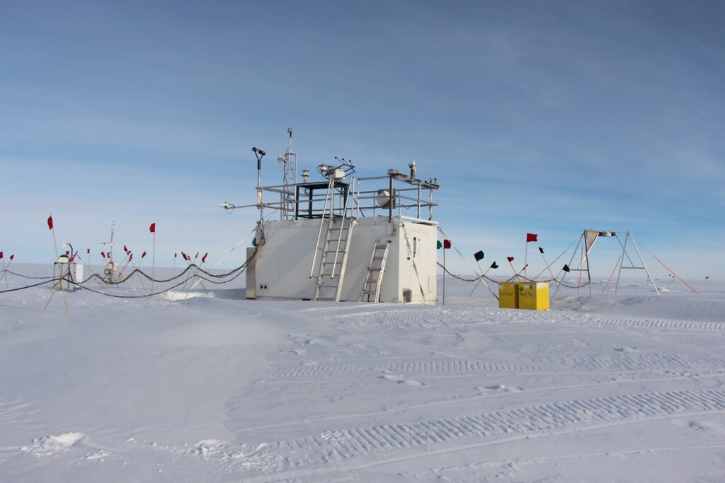 Instruments are situated on a container and on the ice during AWARE.
