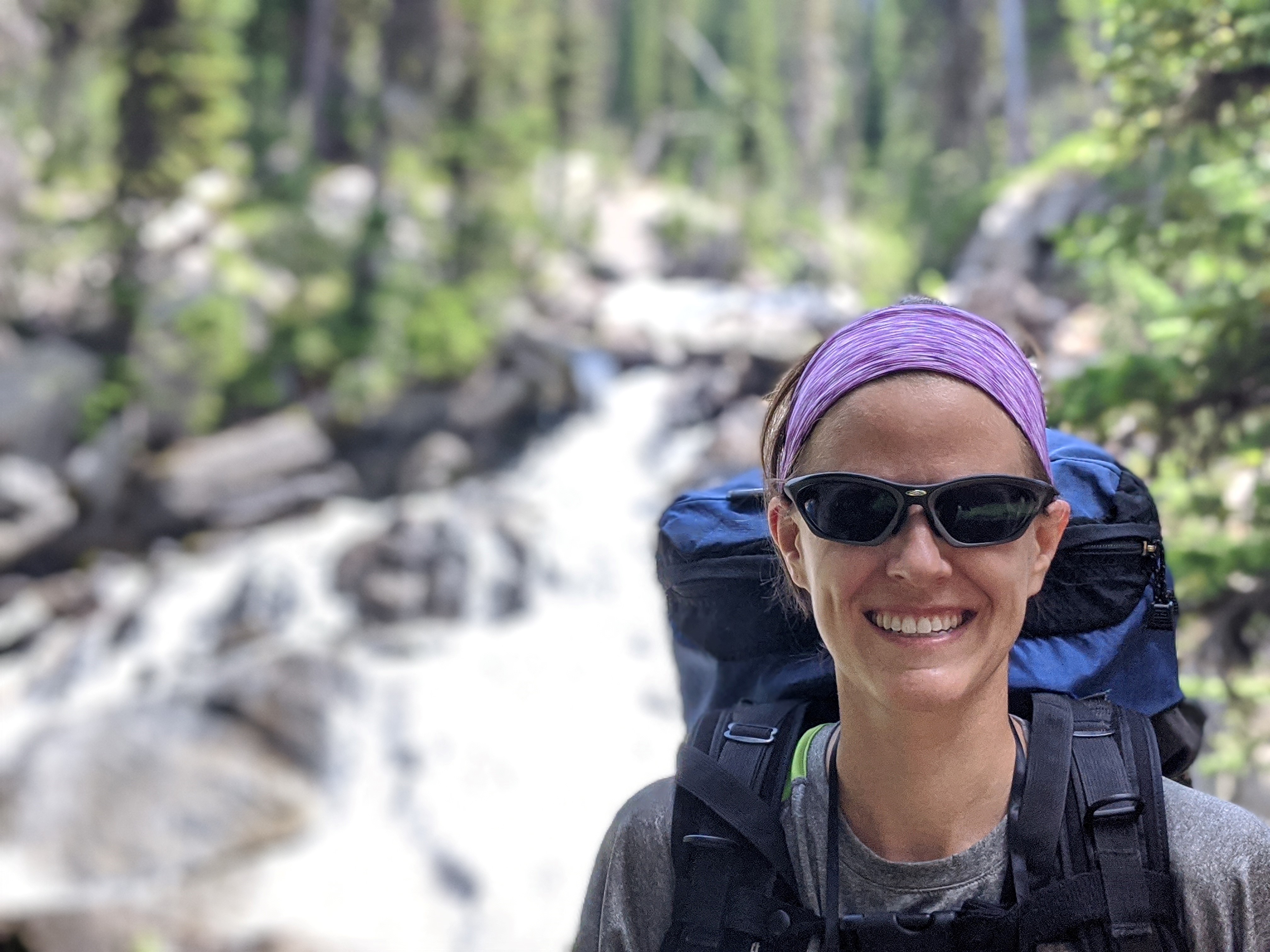 Susannah Burrows smiles while on a hike.