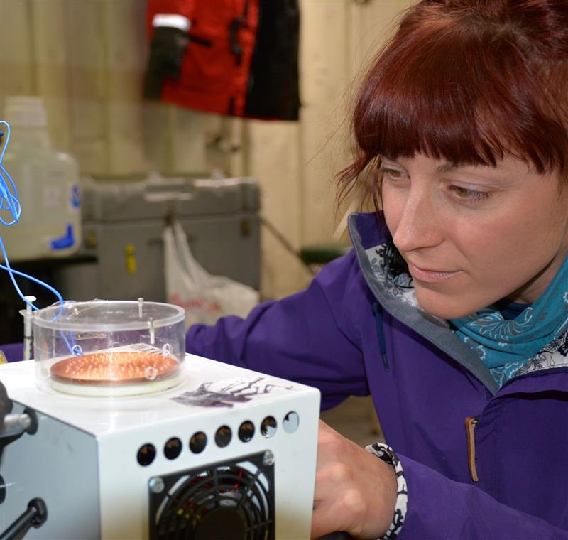 Jessie Creamean sets up a sampling device for ice-nucleating particles.