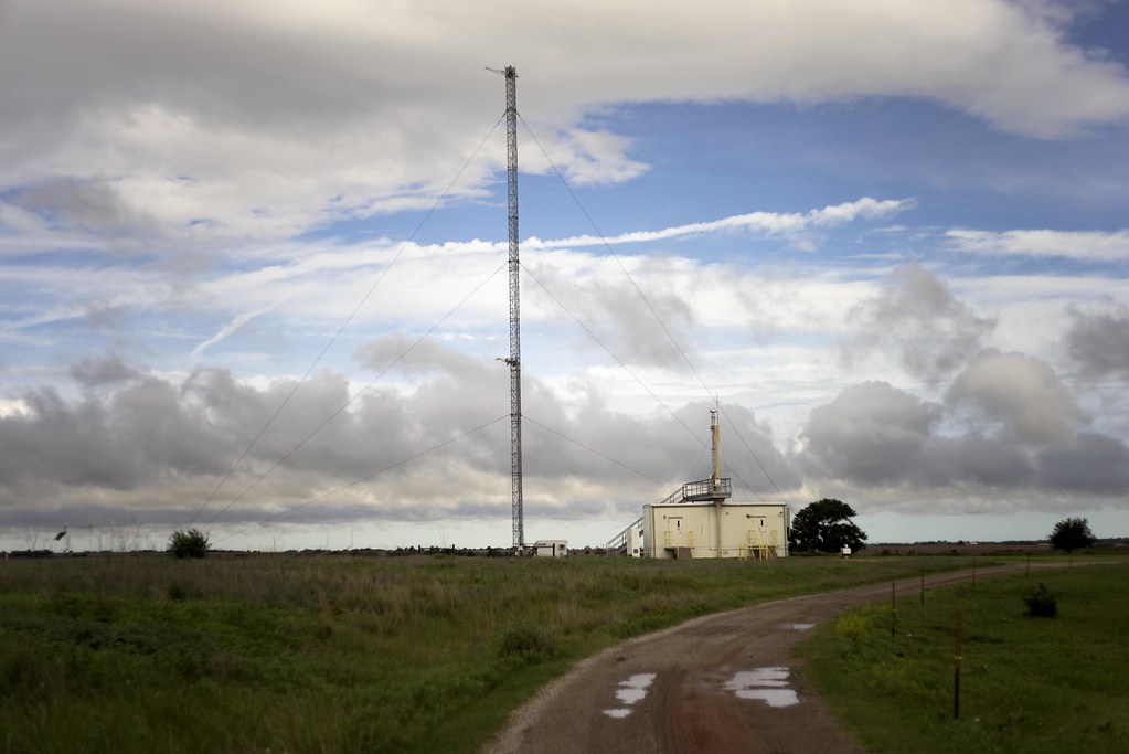 A 60-meter tower stands tall at the Southern Great Plains Central Facility, next to the Aerosol Observing System.