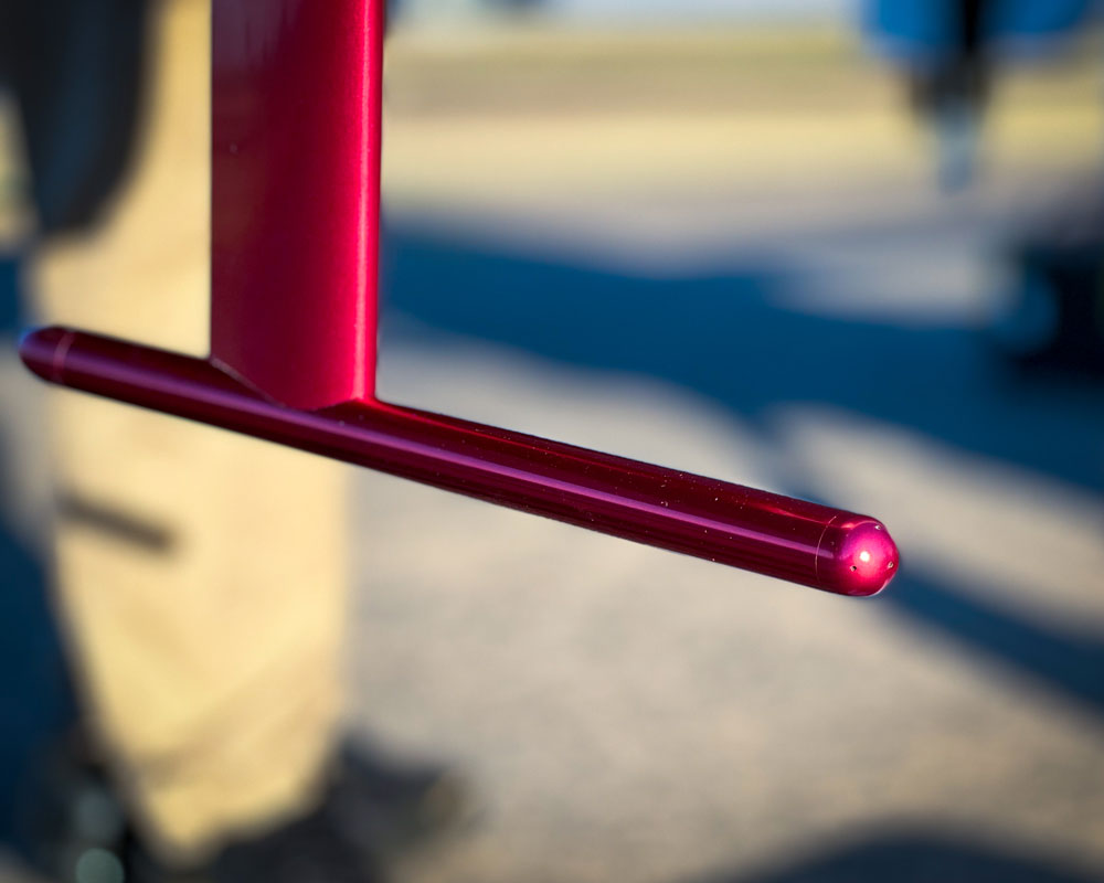 The photo is a close-up of a red probe.