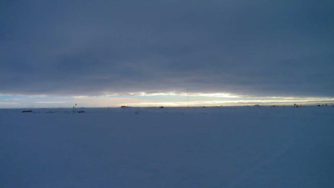 A polluted air mass stretches across the central Arctic sky.