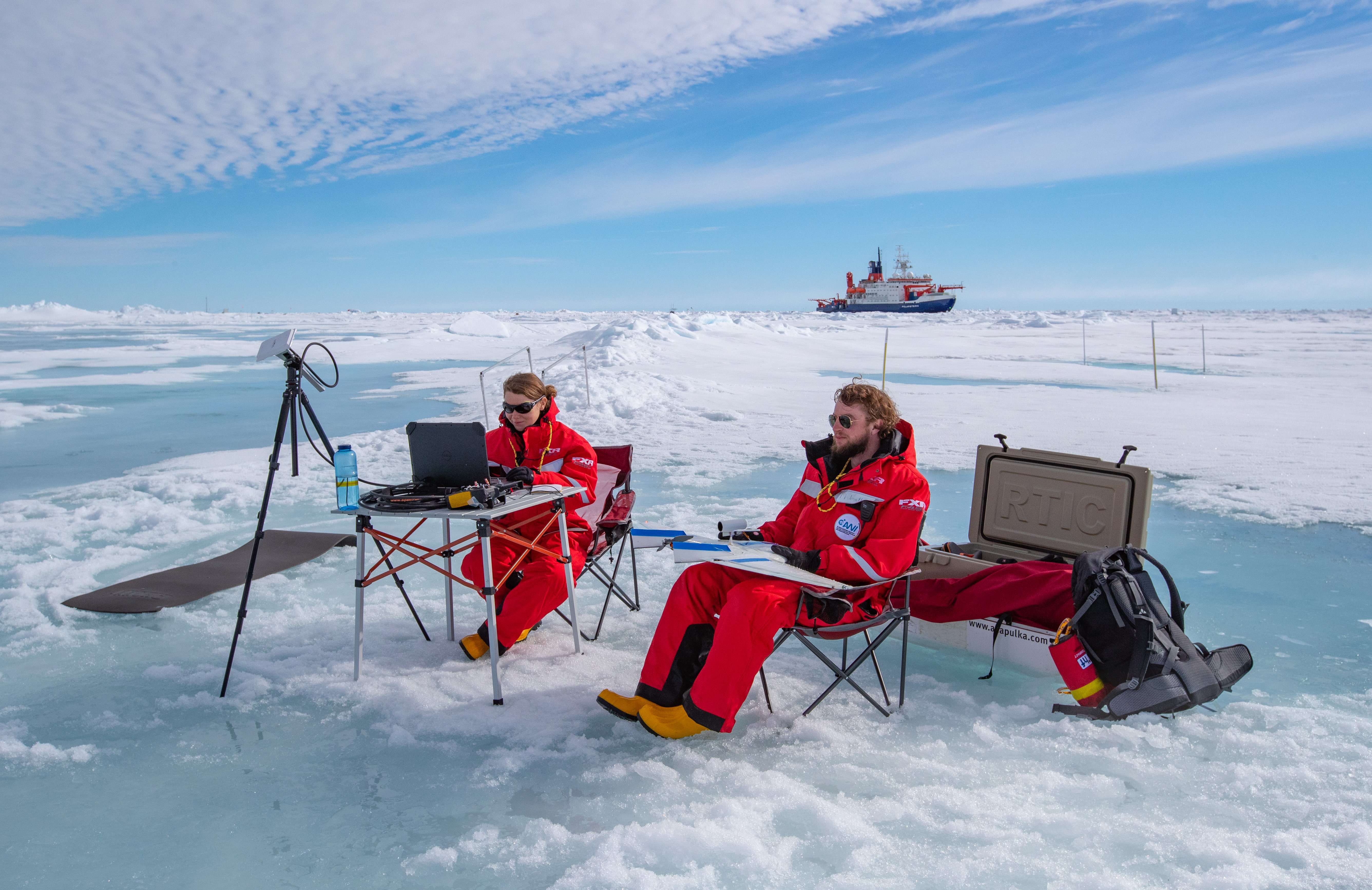 UAS pilot Jonathan Hamilton and researcher Radiance Calmer work in the central Arctic during MOSAiC
