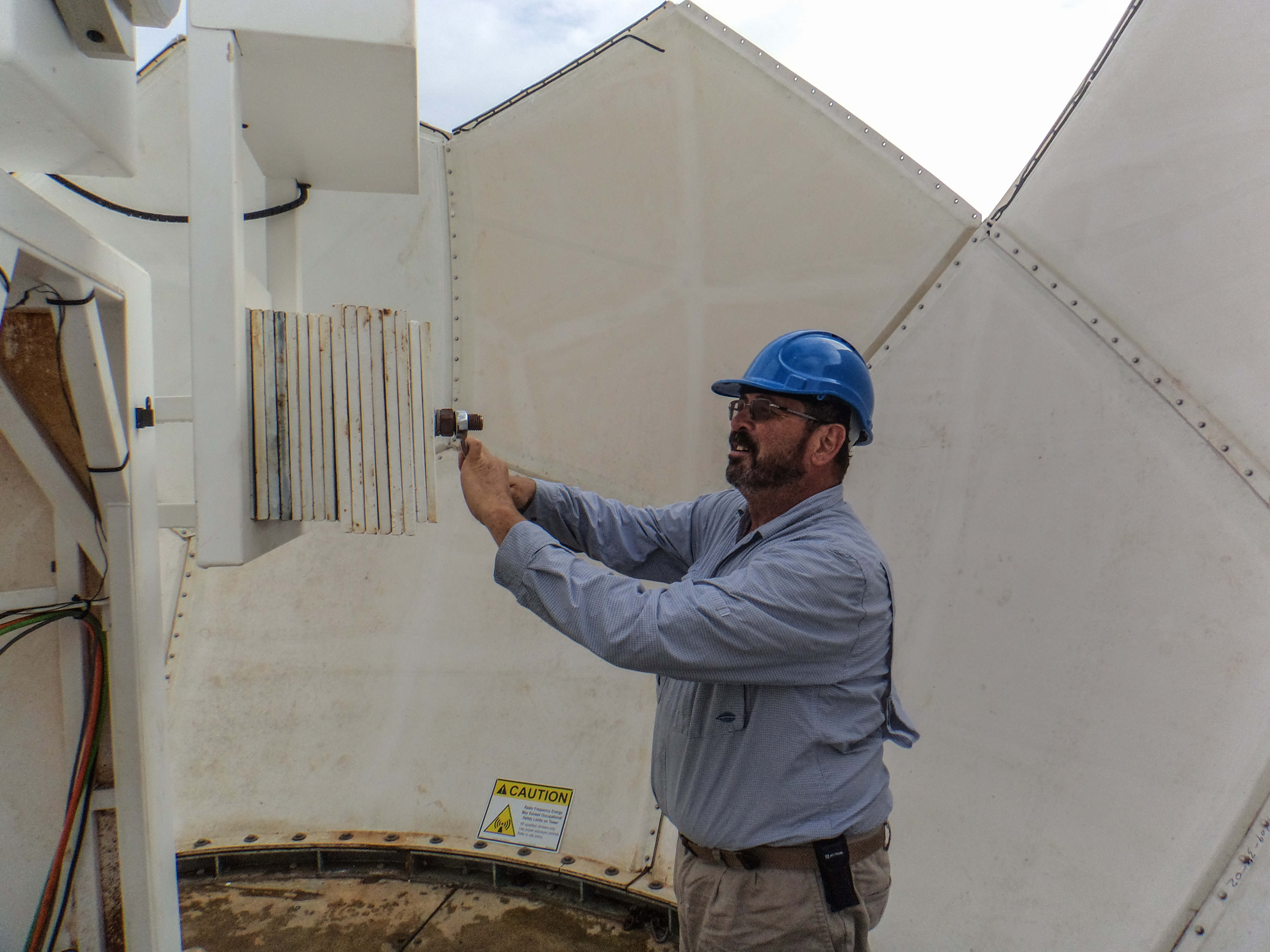 Paul Ortega works on an ARM radar in Papua New Guinea