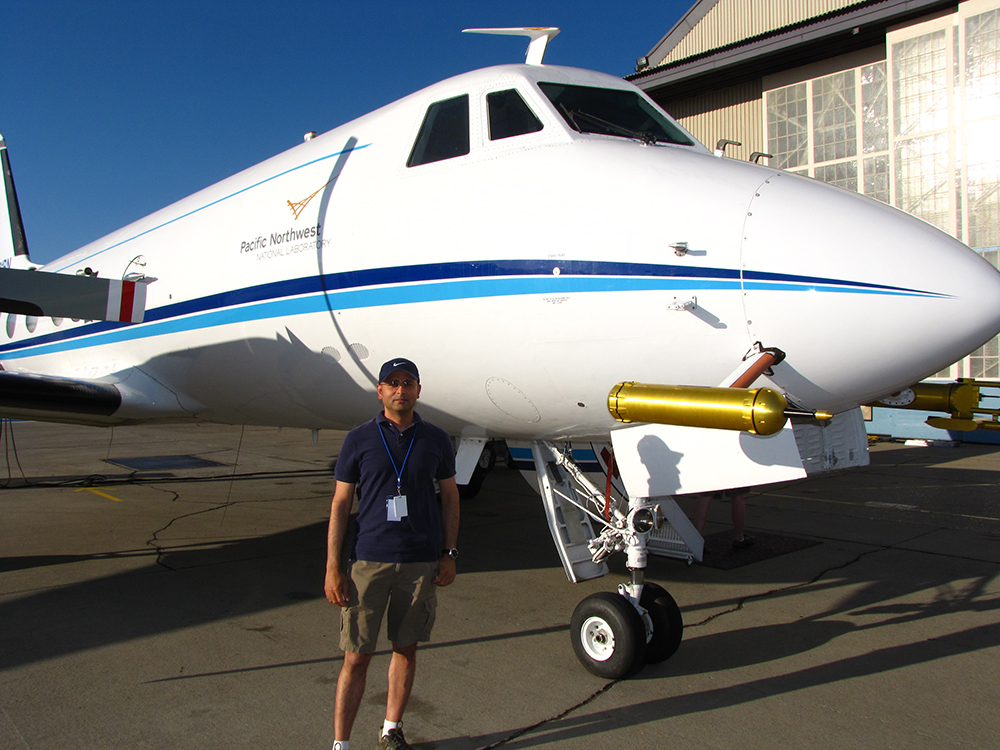 Rahul Zaveri stands next to the G-1.