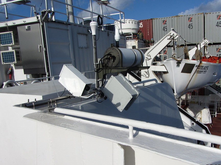 ARM instruments and containers are set up on a cargo ship.