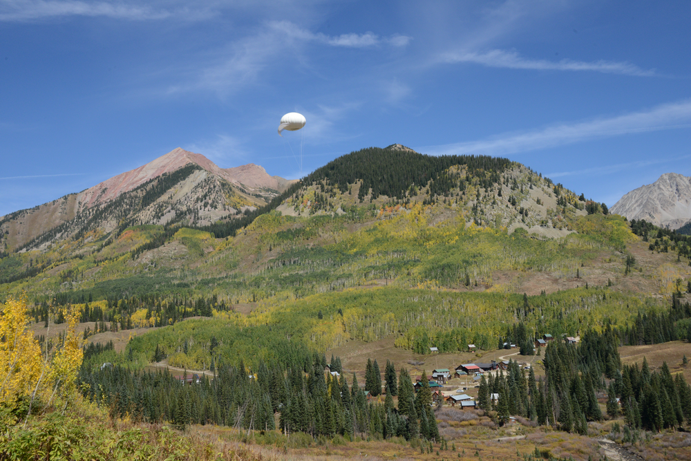 Tethered balloon is seen with Gothic Mountain in the distance
