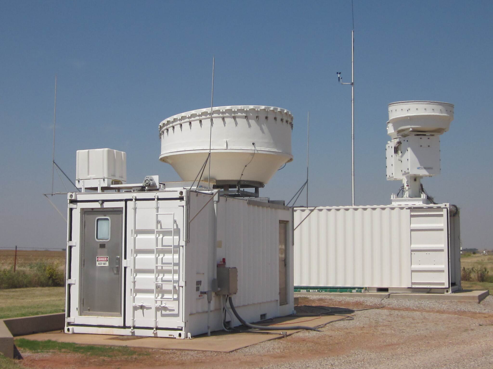 The picture shows radars at the Southern Great Plains atmospheric observatory.