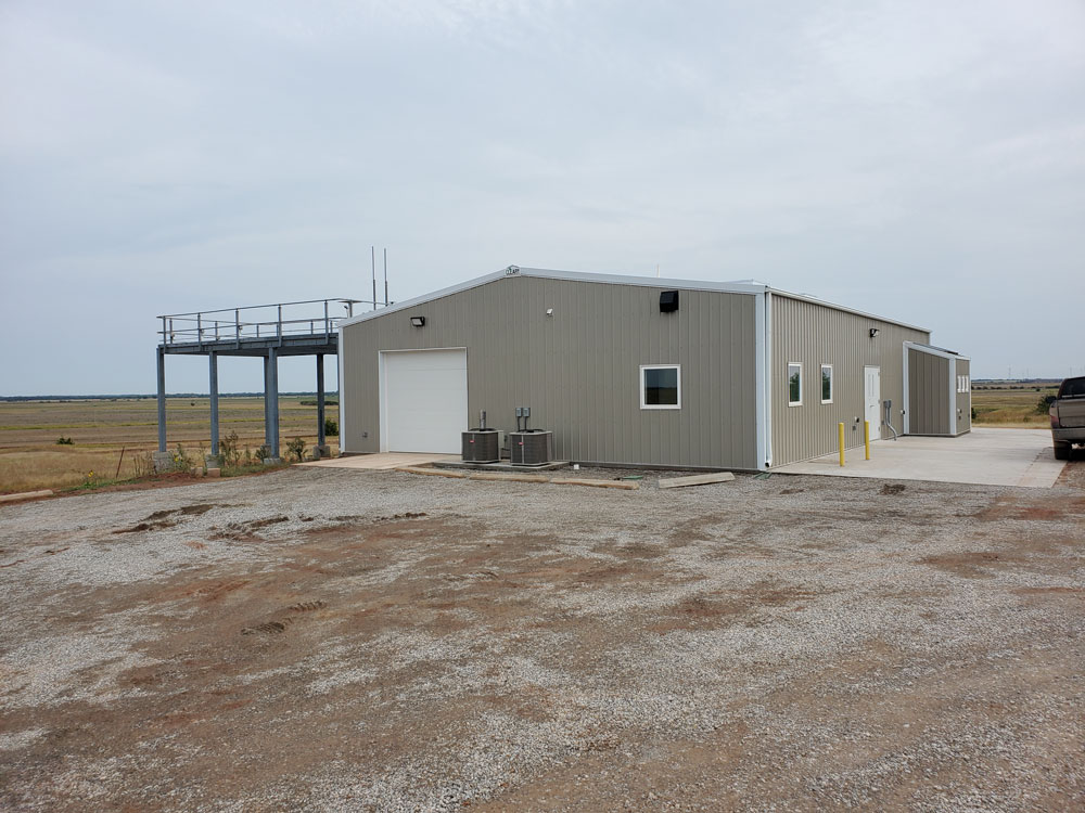 This view of the new Guest Instrument Facility at ARM’s Southern Great Plains Central Facility shows the garage door and instrument deck.