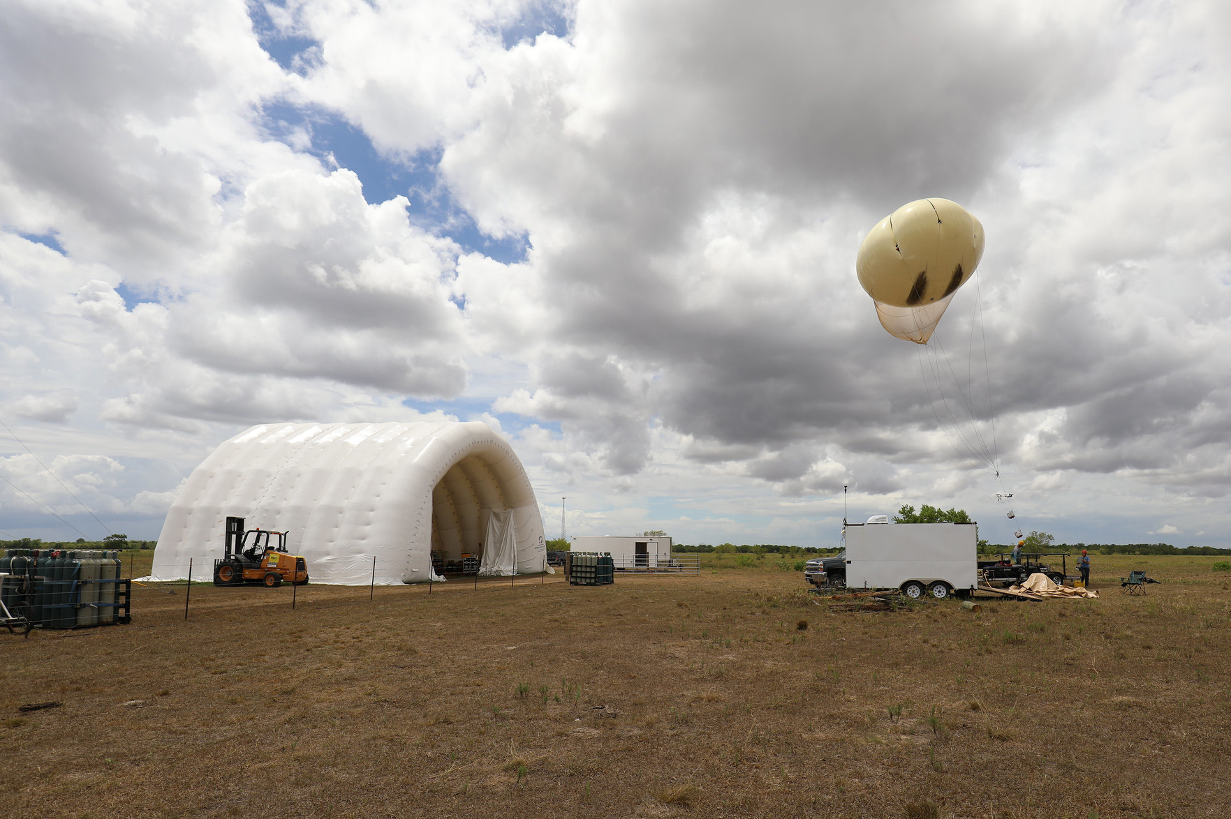 This ARM tethered balloon system (TBS) flight occurred August 6, 2022, in Guy, Texas, as part of the TRacking Aerosol Convection interactions ExpeRiment (TRACER). As part of ARM’s latest proposal call with the Environmental Molecular Sciences Laboratory (EMSL), scientists can propose to analyze samples from past TBS flights, including those during TRACER. Photo is by Guy Tubbs. 