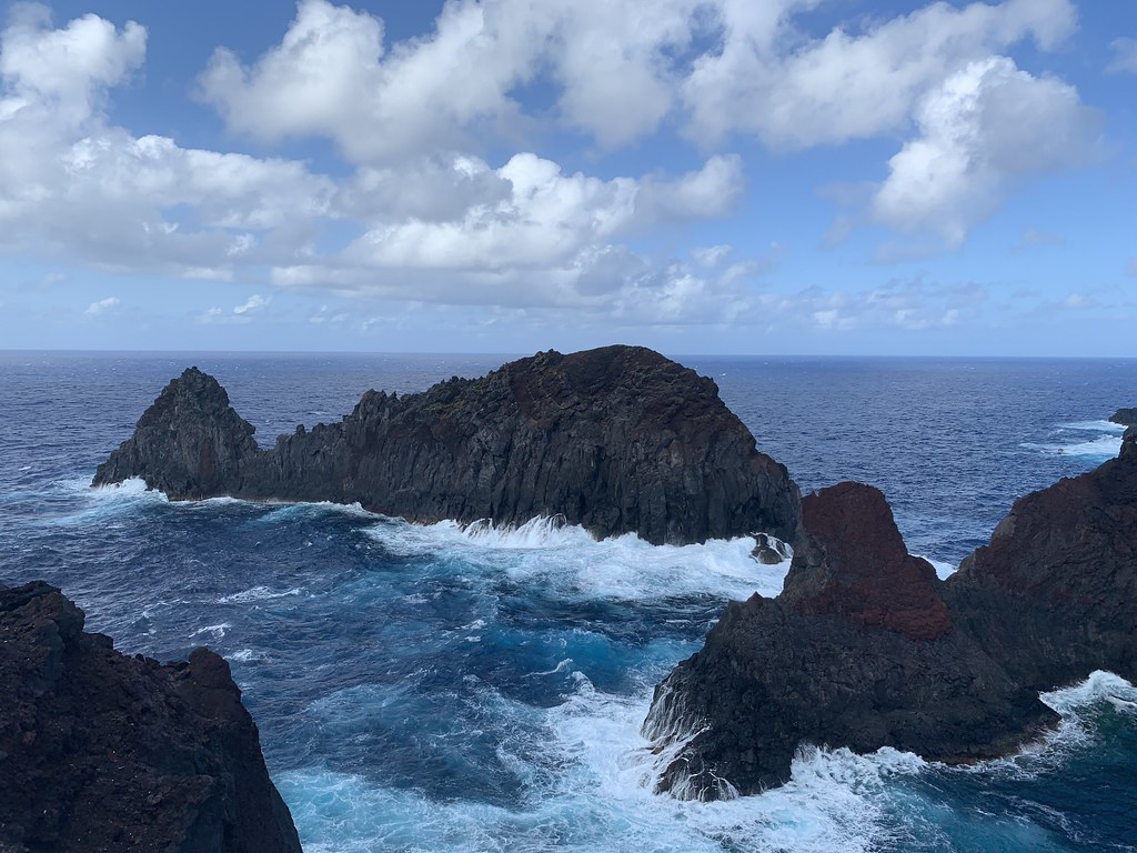 Waves crash into rocks along the coast of Graciosa.