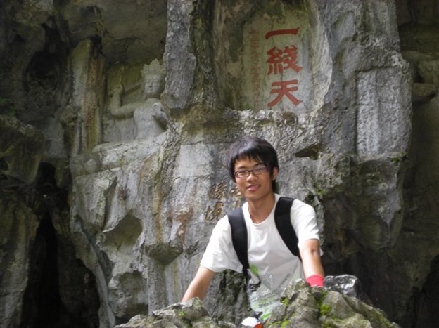 Youtong Zheng briefly pauses during his hike for a picture.