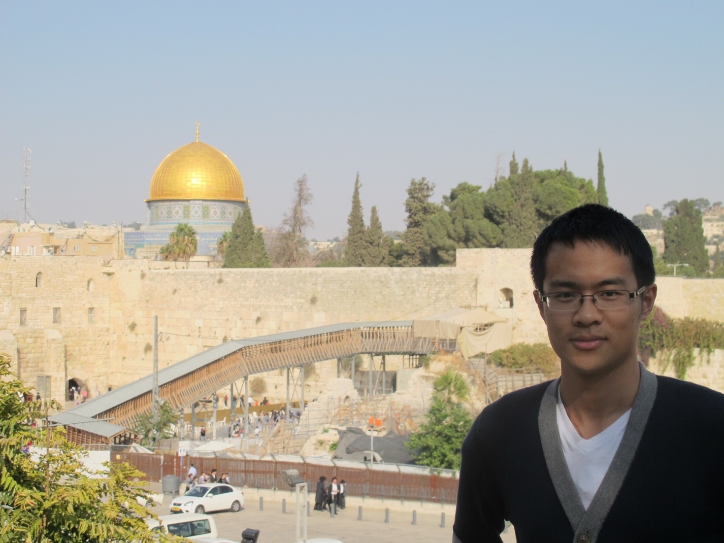 Youtong Zheng pauses for a picture in Jerusalem's Old City.