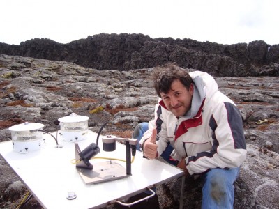 Local AMF technician Carlos Sousa gives a thumbs-up after installing the radiometers outside the Pico Observatory. ARM file photo. 