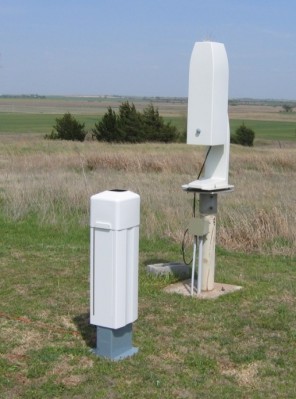 After a 3-day period of side-by-side operations and acceptance testing, the new CL31 ceilometer (foreground) officially replaced the older CT25K model on April 16, 2010 at the SGP site. ARM file photo. 