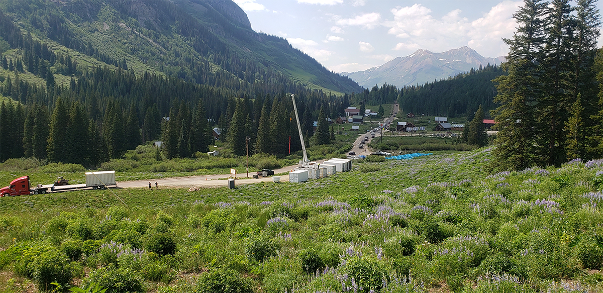 ARM Mobile Facility container is moved into place by truck at Gothic Townsite, Colorado