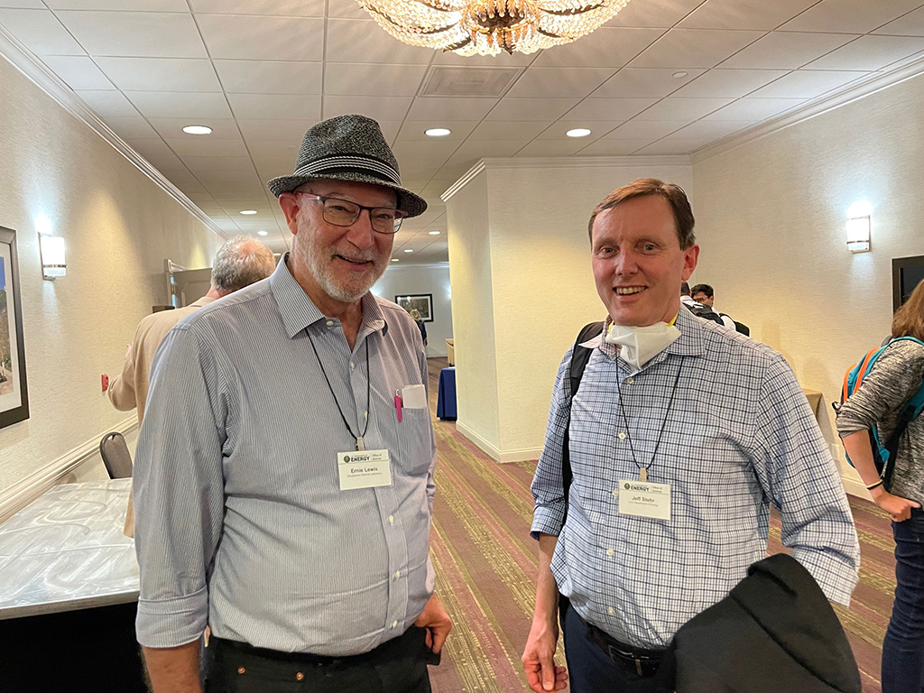 Ernie Lewis and Jeff Stehr pause their conversation to smile for the camera.