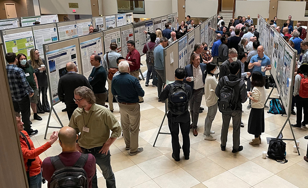 People make their way through rows of posters at the ARM/ASR joint meeting.