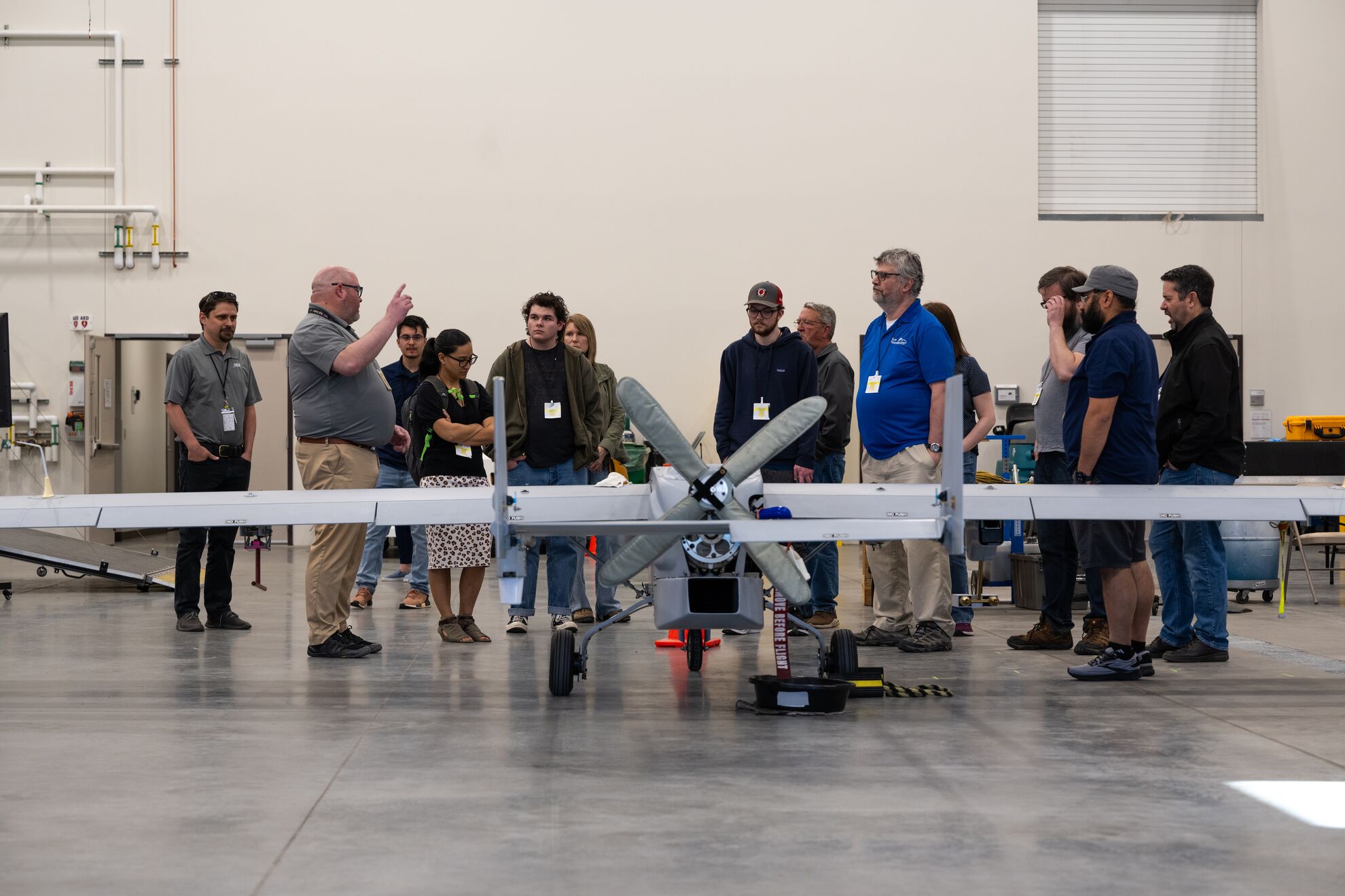 Pete Carroll, the uncrewed aerial system operations lead for the ARM Aerial Facility, explains the flight characteristics of the ArcticShark to Blue Mountain Community College staff and students. Photo is by Andrea Starr, Pacific Northwest National Laboratory.