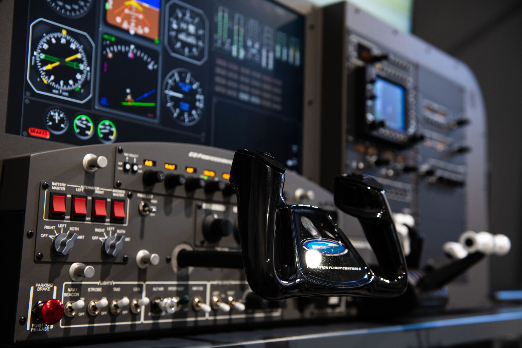 Closeup of the controls on a flight simulator