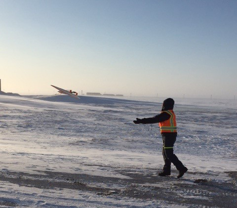 A DataHawk, robust enough for aerial measurements in the Arctic, is launched at Oliktok Point, Alaska.